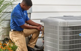 HVAC technician installing a new air conditioner