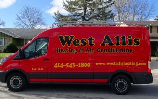 West Allis Heating service truck in front of home