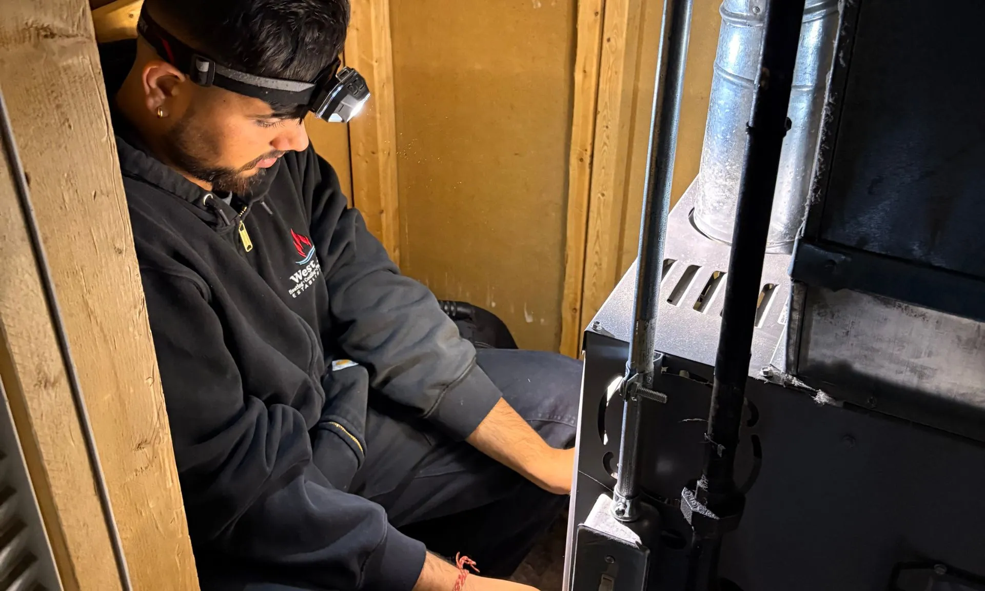 HVAC_Technician_Performing_HVAC_Maintenance Home Heating Repair Services in Milwaukee & surrounding cities